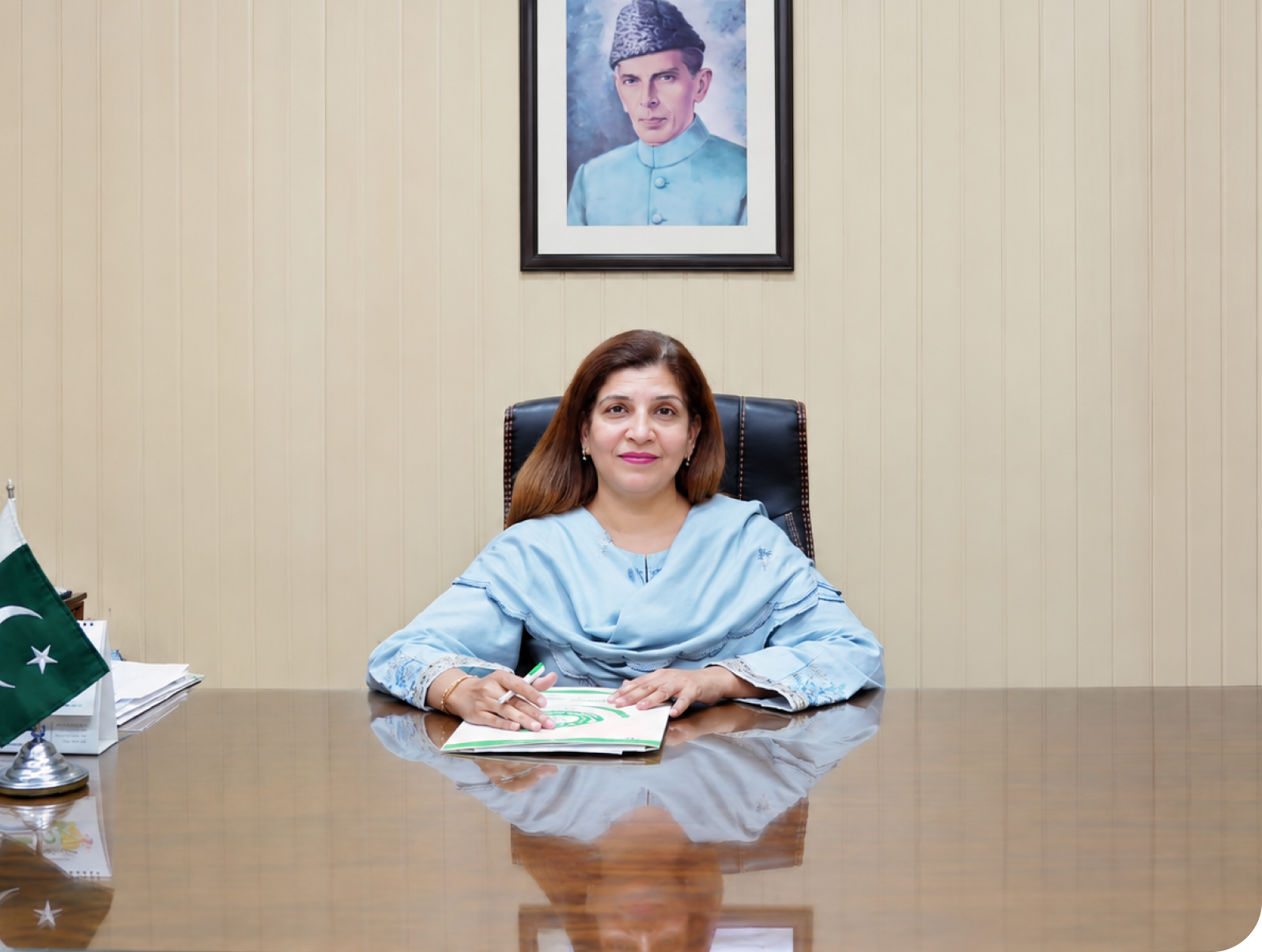 Principal at her desk